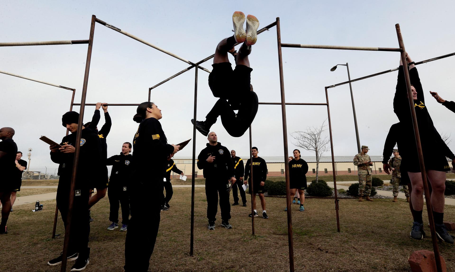 In this Jan. 8, 2019, file photo, US Army troops training to serve as instructors participate in the new Army combat fitness test at the 108th Air Defense Artillery Brigade compound at Fort Bragg, North Carolina. 