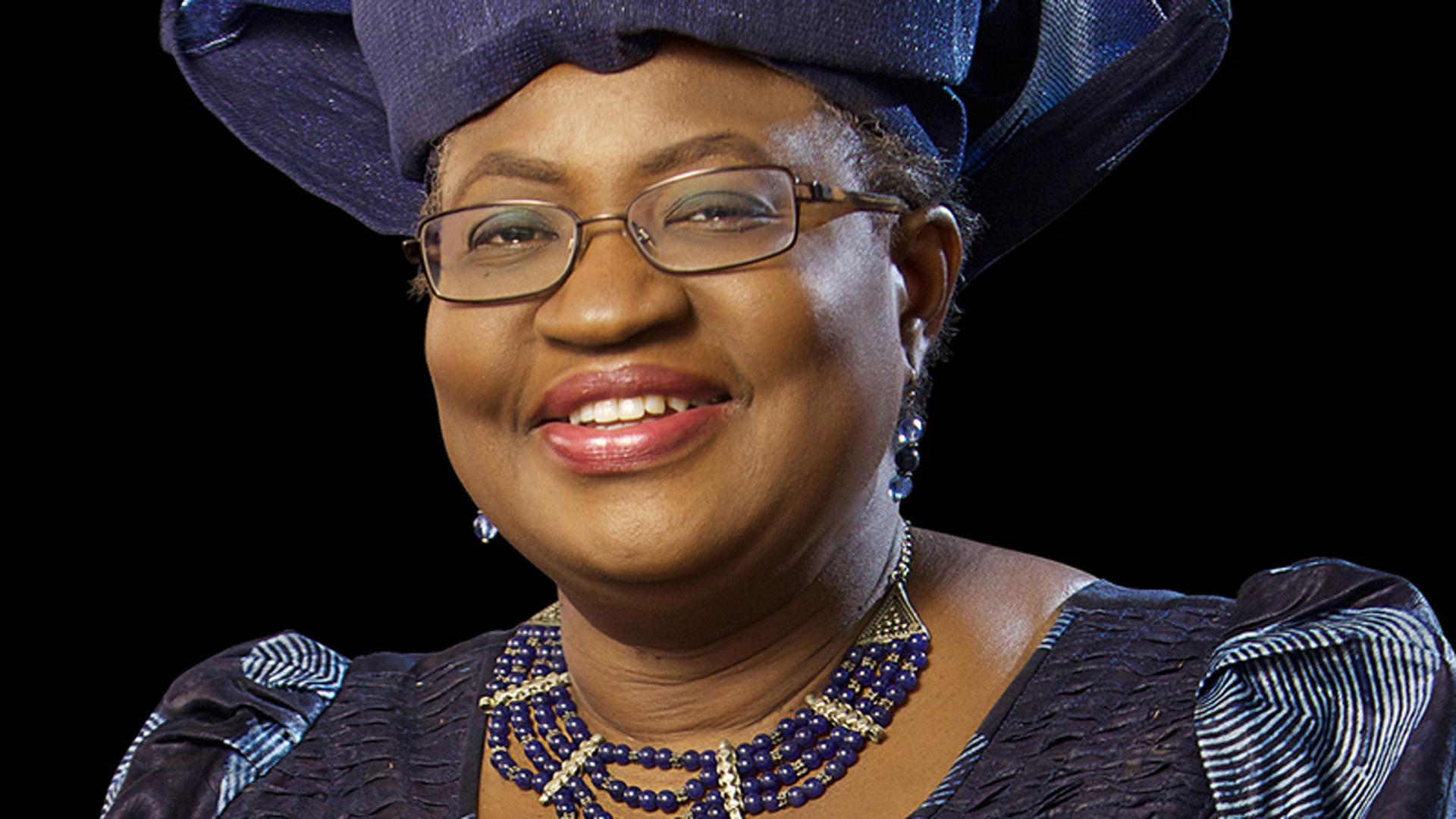 Author Ngozi Okonjo-Iweala poses for the camera in a dark blue outfit