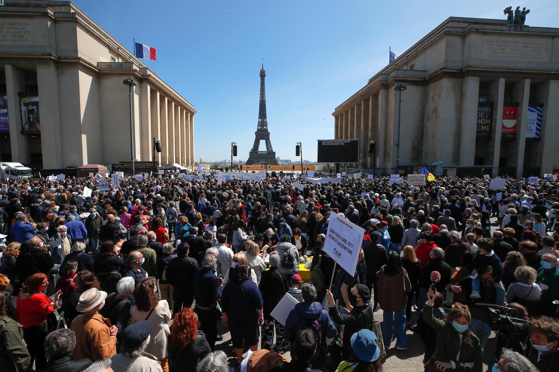 People stage a protest organized by Jewish associations, who say justice has not been done for the killing of French Jewish woman Sarah Halimi, at Trocadero Plaza near Eiffel Tower in Paris, Sunday, April 25, 2021. 
