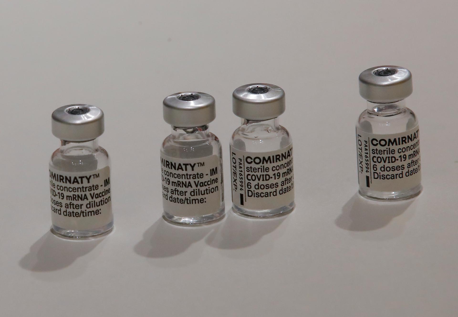 Four vials of the COVID-19 vaccine doses