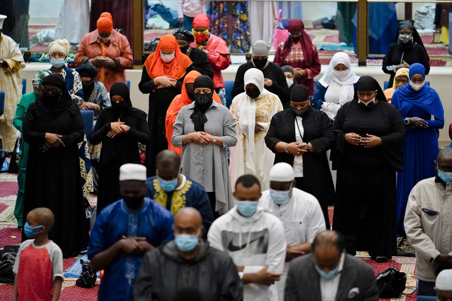 Worshippers perform an Eid al-Fitr prayer at the Masjidullah Mosque in Philadelphia, on Thursday, May 13, 2021