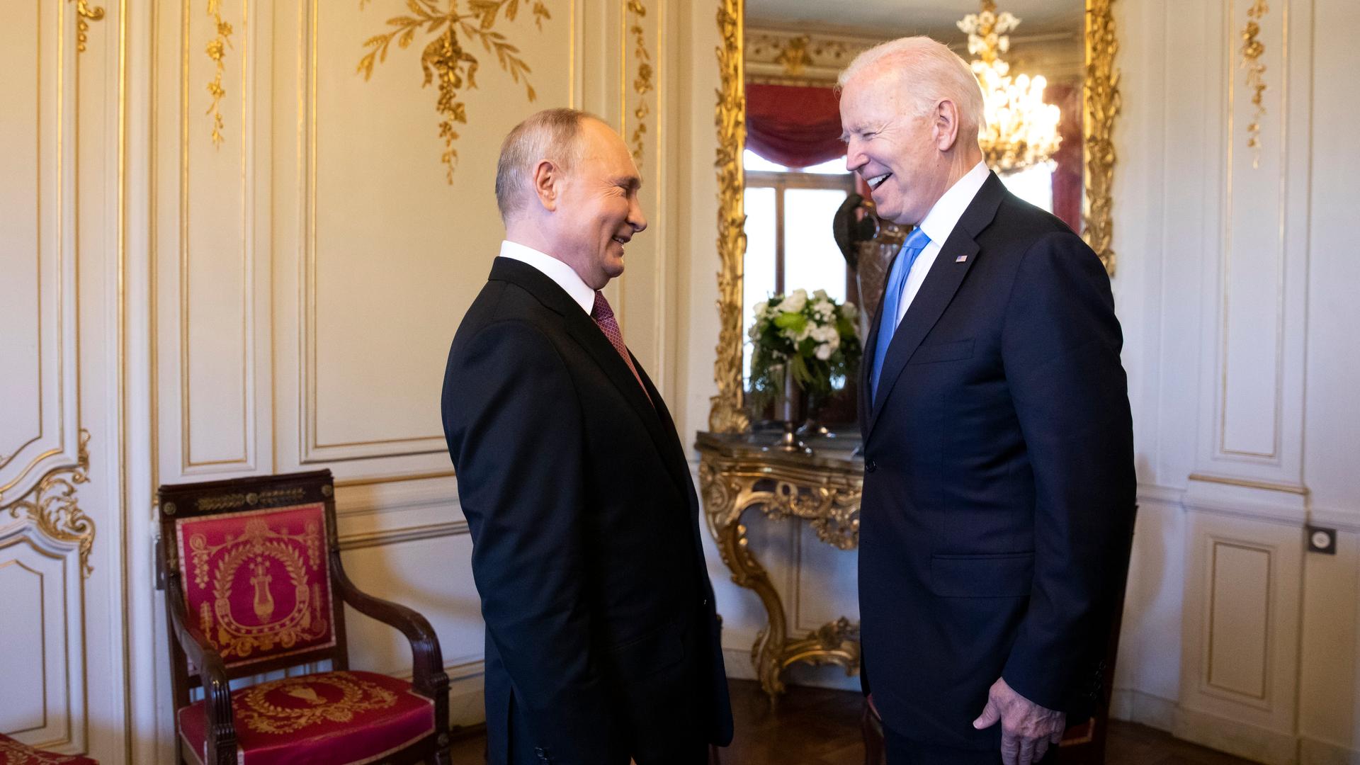 Russian president Vladimir Putin, left, talks with US President Joe Biden, right, during the US-Russia summit in Geneva, Switzerland, Wednesday, June 16, 2021.