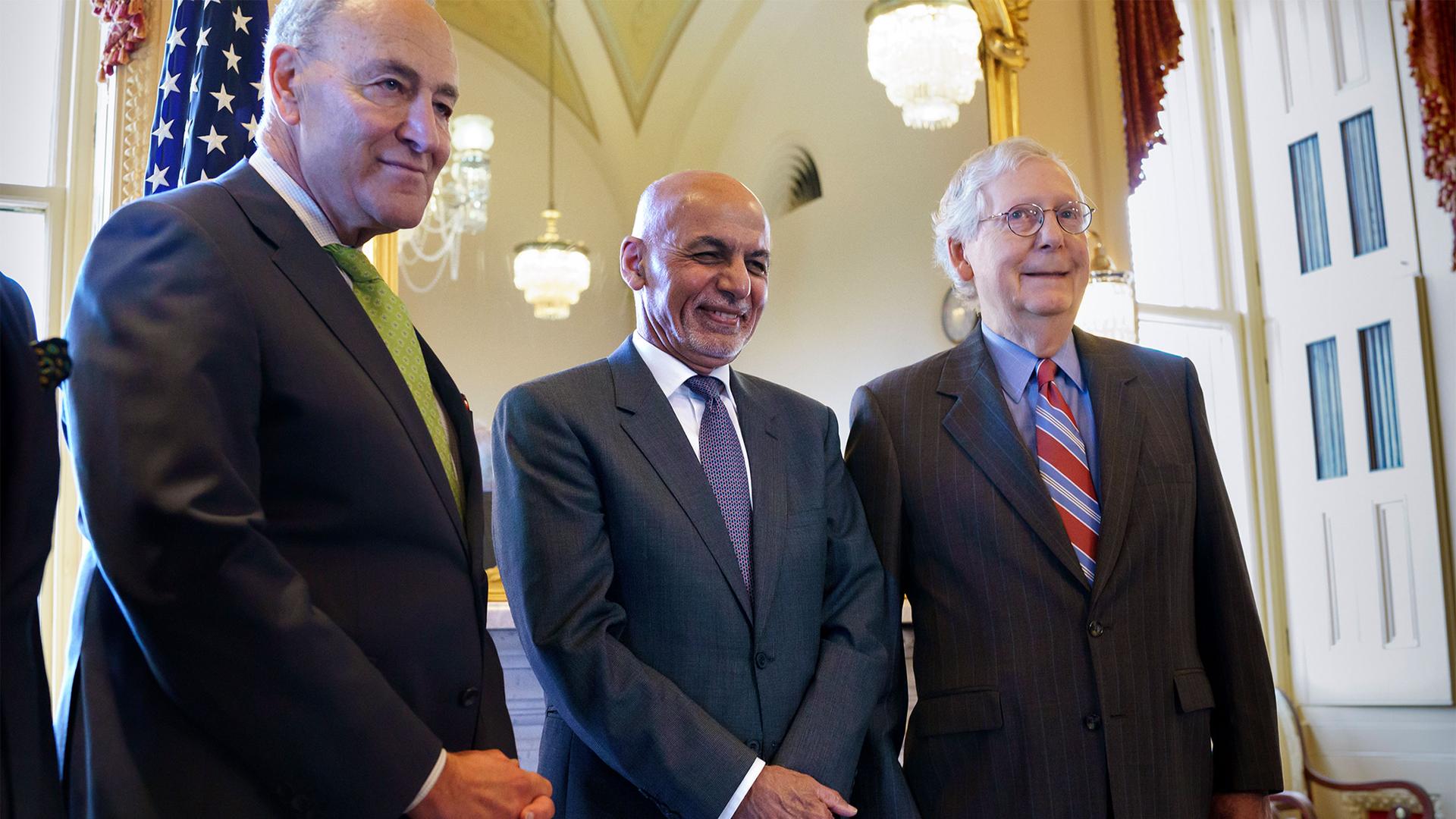Senate Majority Leader Chuck Schumer, President of Afghanistan Ashraf Ghani and Senate Minority Leader Mitch McConnell stand together at the Capitol