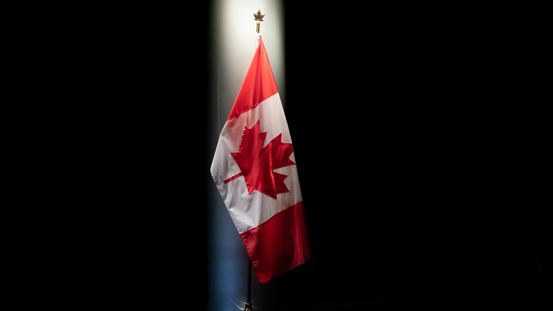 The Canadian flag is illuminated in the Embassy of Canada in Washington in Washington, Thursday, June 20, 2019. 