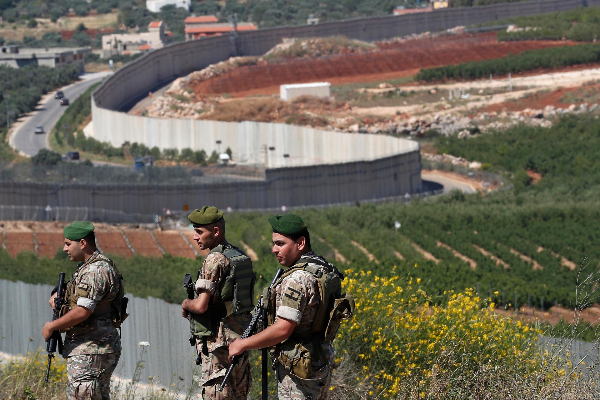 Lebanese army soldiers deploy on Lebanon's side of the Lebanese-Israeli border in the southern village of Kfar Kila
