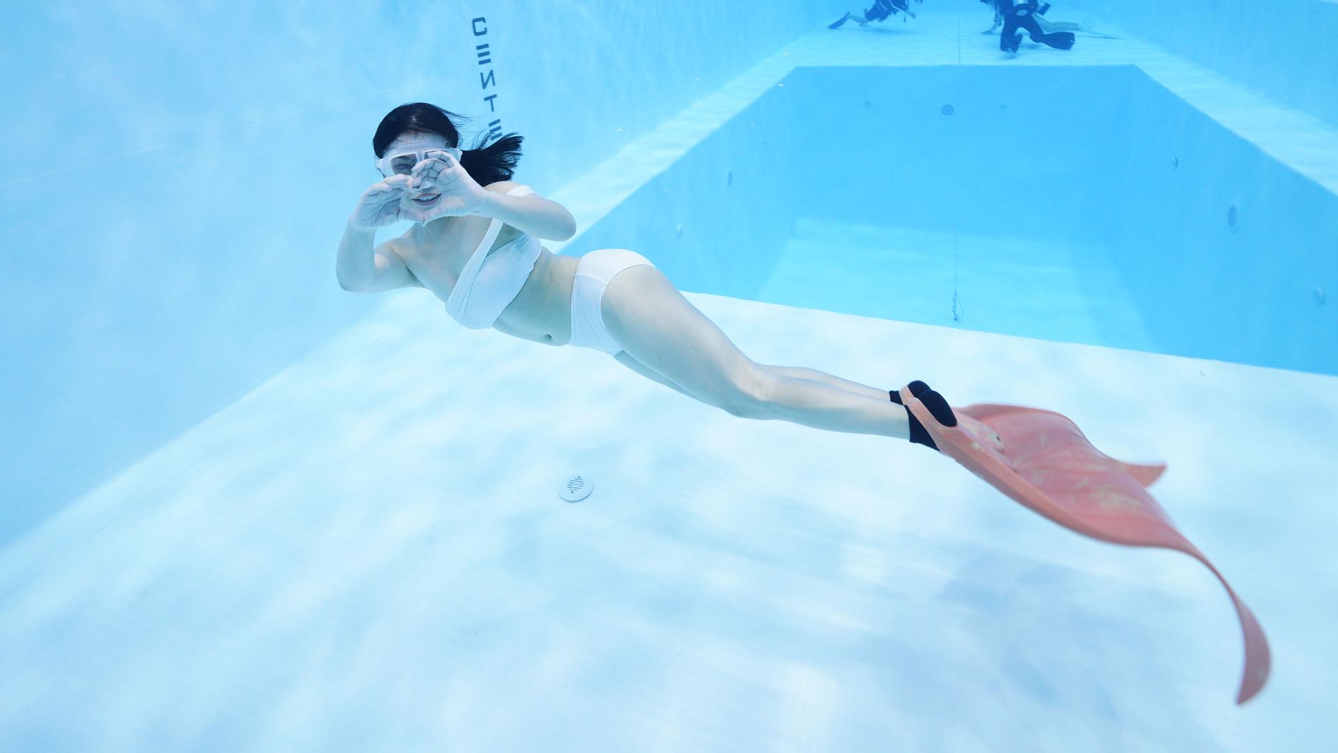 Christina Bao training underwater as a mermaid. 
