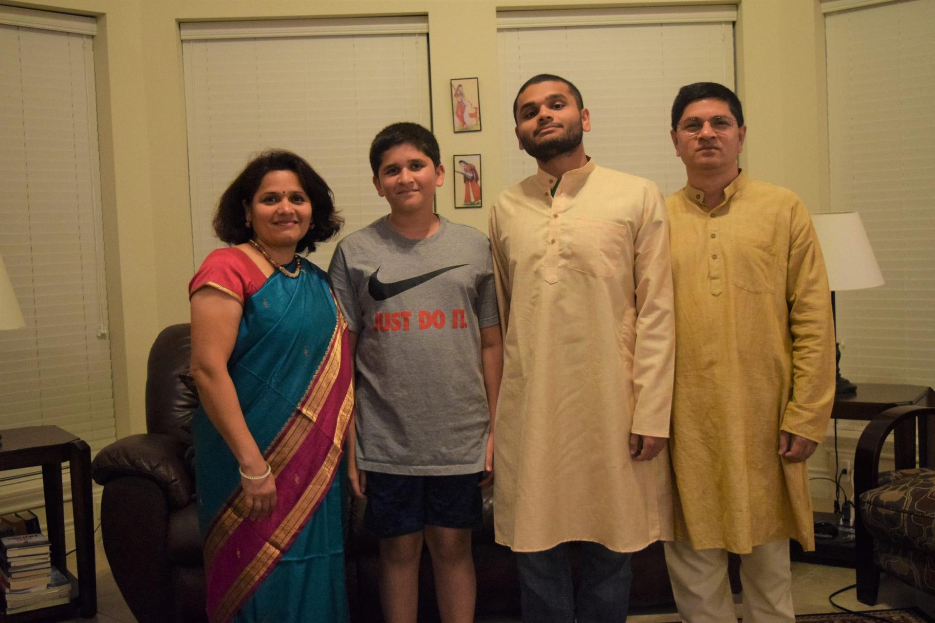 Animesh Namjoshi, center right, celebrates Diwali with his father, Jayant, mother, Sarita, and brother Aditya.