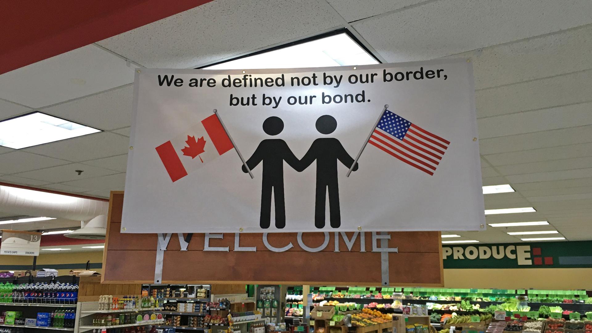 Several businesses in Point Roberts display this sign of solidarity, seen here inside Point Roberts International Marketplace.