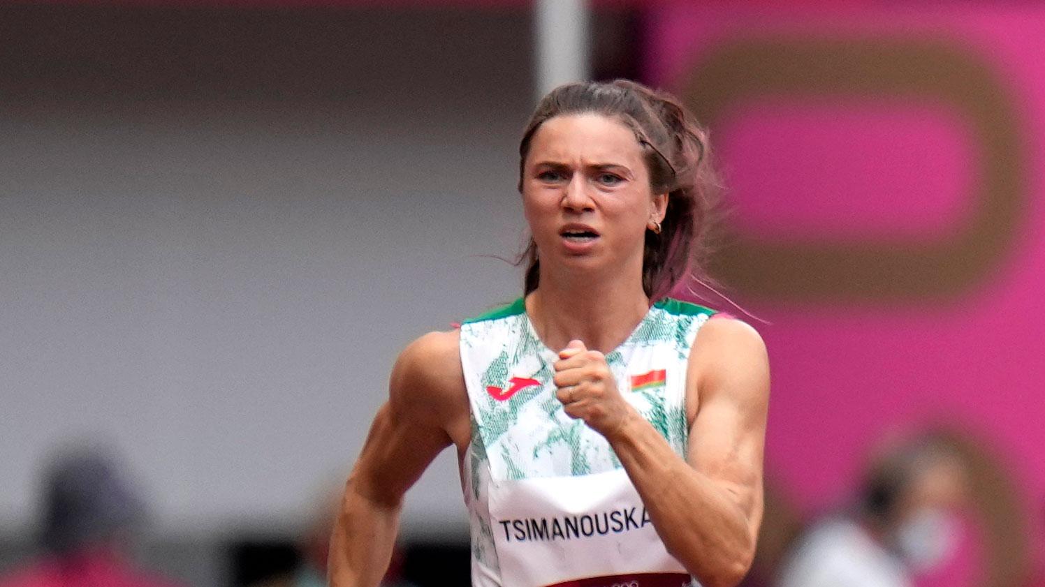 Krystsina Tsimanouskaya is shown running and wearing the track and field uniform for Belarus.