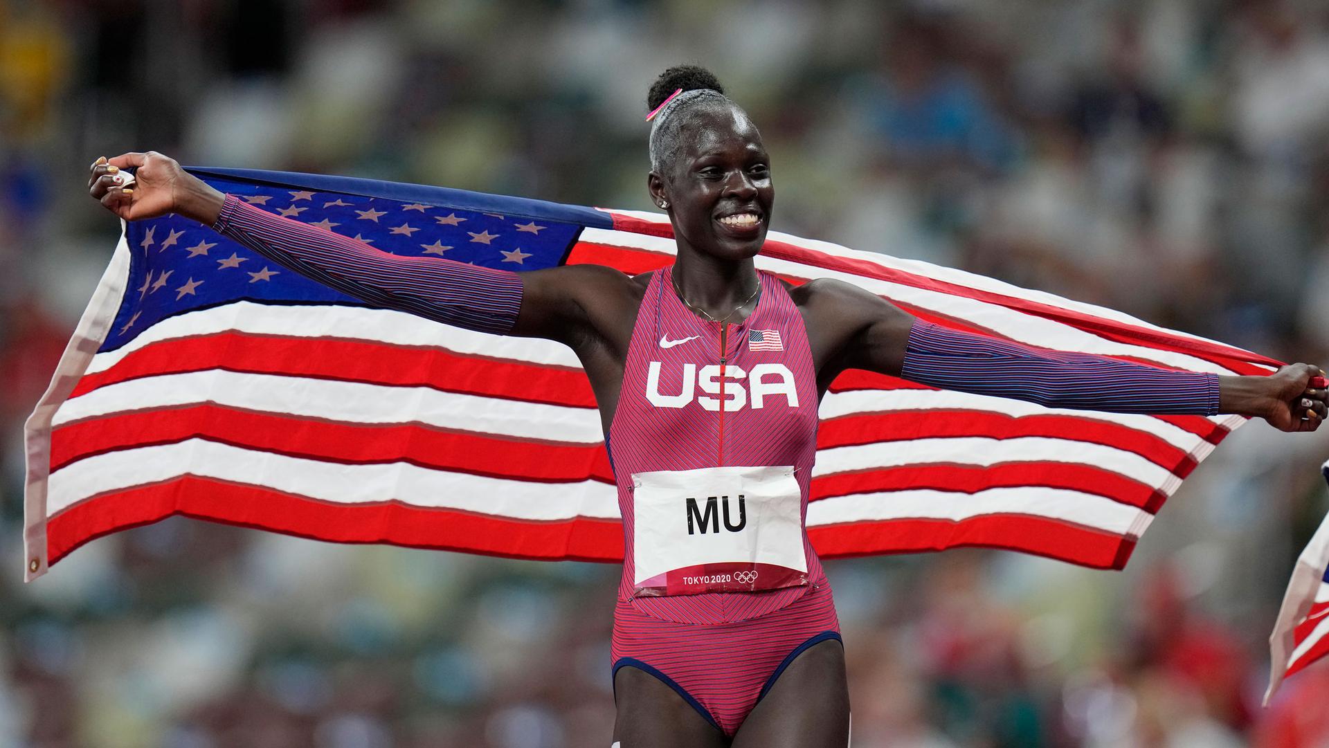Athing Mu, of United States, reacts after winning the final of the women's 800-meters at the 2020 Summer Olympics, Tuesday, Aug. 3, 2021, in Tokyo. 