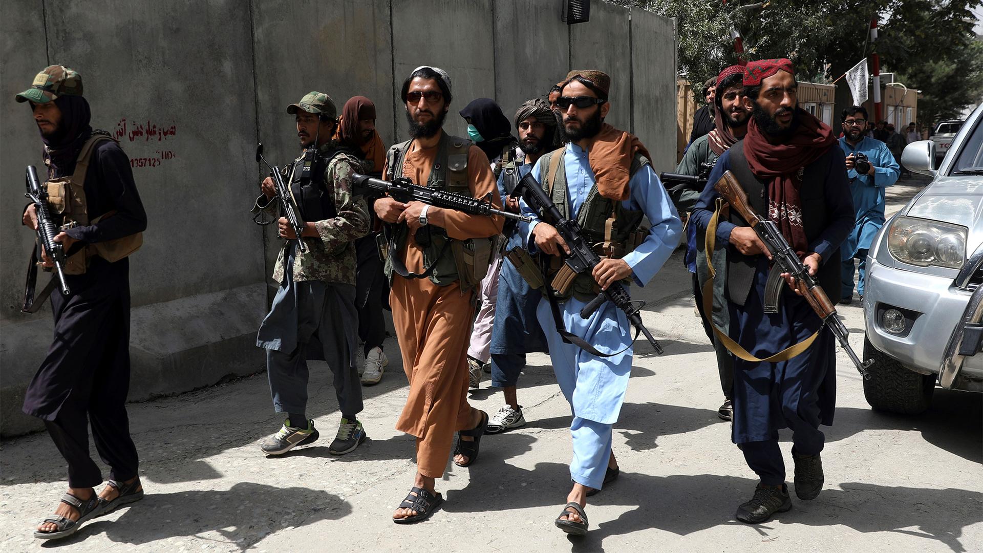 Taliban fighters patrol in Wazir Akbar Khan neighborhood in the city of Kabul, Afghanistan