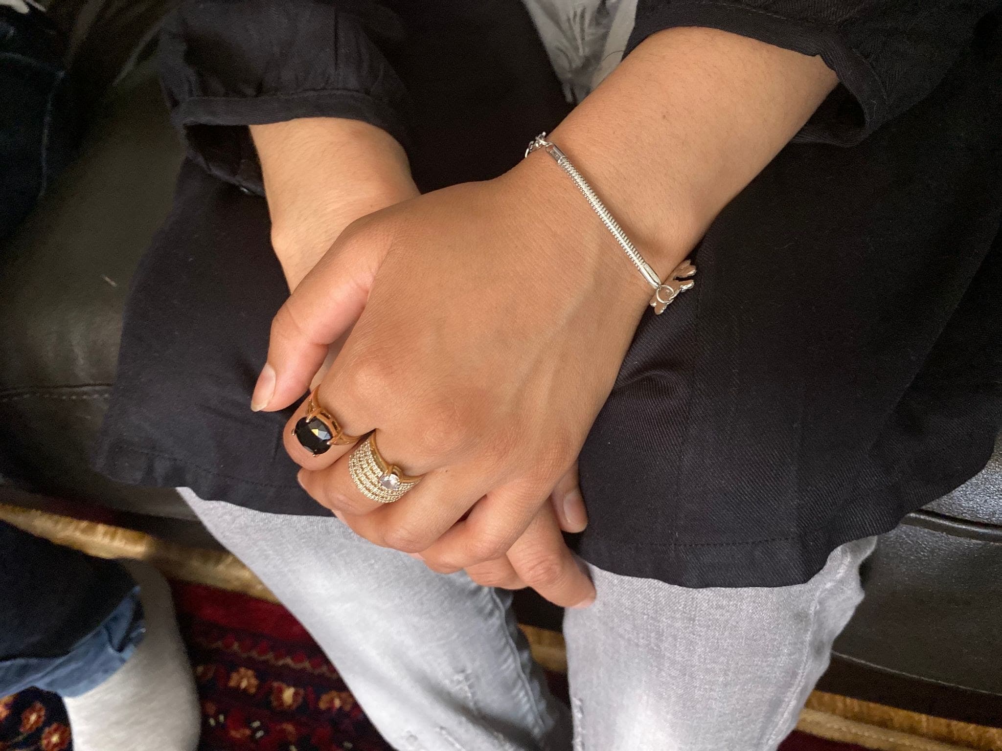 A newly arrived Afghan woman is now safe in the United States, after fleeing Afghanistan. Only her immediate relatives know she has left. Her husband worked with US military forces and she fears Taliban reprisals.