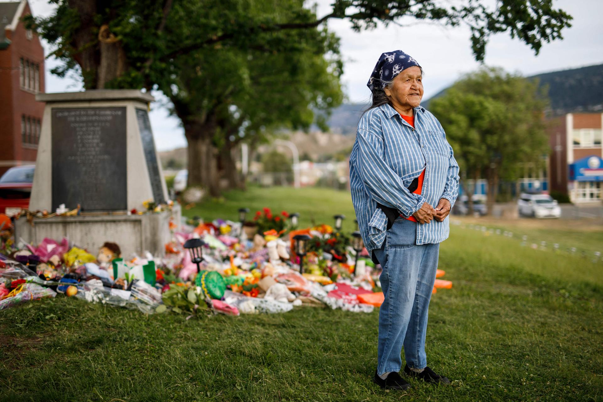 Kamloops Indian Residential School former student Evelyn Camille, 82, at a makeshift memorial to the 215 children whose remains were discovered buried near the facility in British Columbia.
