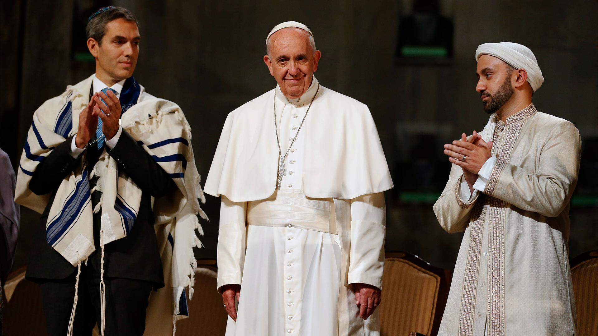 Pope Francis sits with Rabbi Elliot J. Cosgrove (left) and Iman Khalid Latif (right), executive director of the Islamic Center and chaplain to the students at New York University, at a multi-religious gathering during a visit to the 9/11 Memorial Museum i