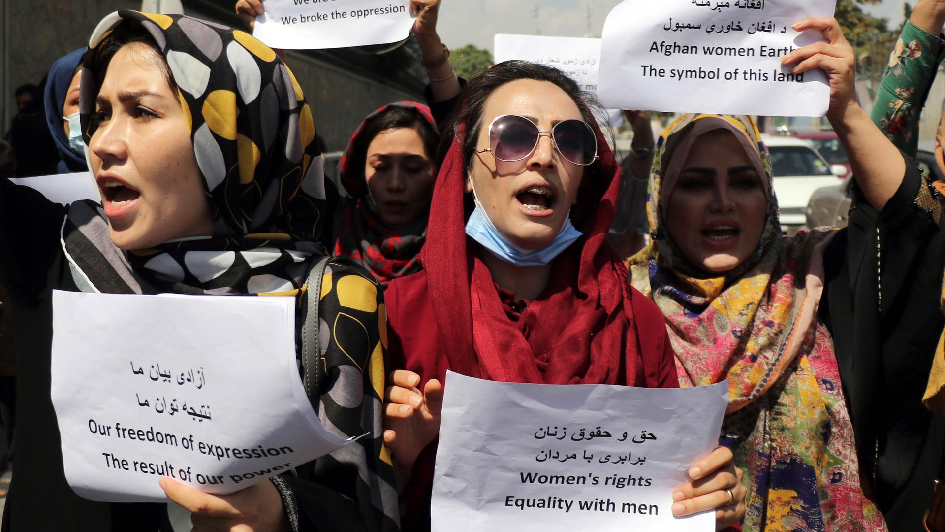 Women gather to demand their rights under the Taliban rule during a protest in Kabul, Afghanistan, Friday, Sept. 3, 2021. 
