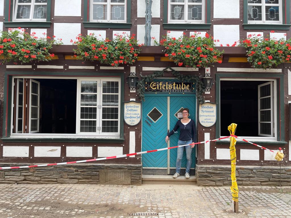 Manuela Schumacher stands amid the ruins of her Eifelstube Restaurant in Bad Neuenahr-Ahrweiler in western Germany in the aftermath of the flood. 