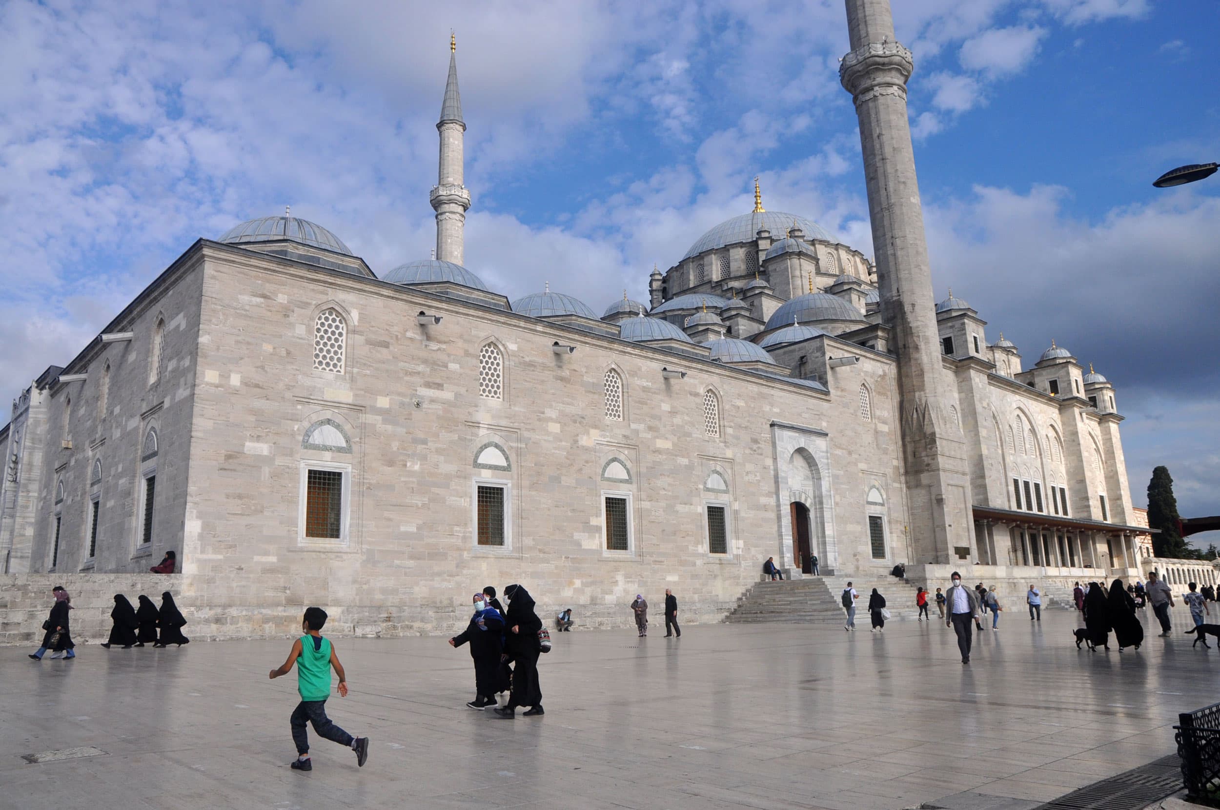 The grounds of the Fatih Mosque, first built in the 15th century, serve as a popular community space for the Syrian community