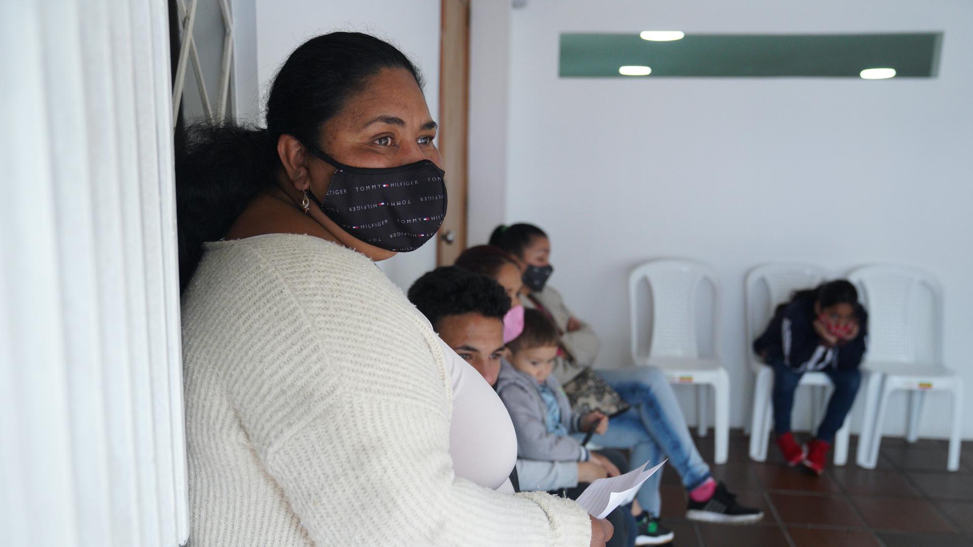Iselle Toledo waits for a medical appointment at Juntos Se Puede an organization that helps Venezuelan migrants in Bogotá, Colombia.