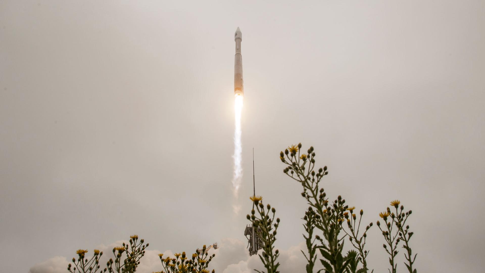 A United Launch Alliance Atlas V rocket carrying the Landsat 9 satellite onboard launches from Vandenberg Space Force Base, California, on Monday, Sept. 27, 2021.