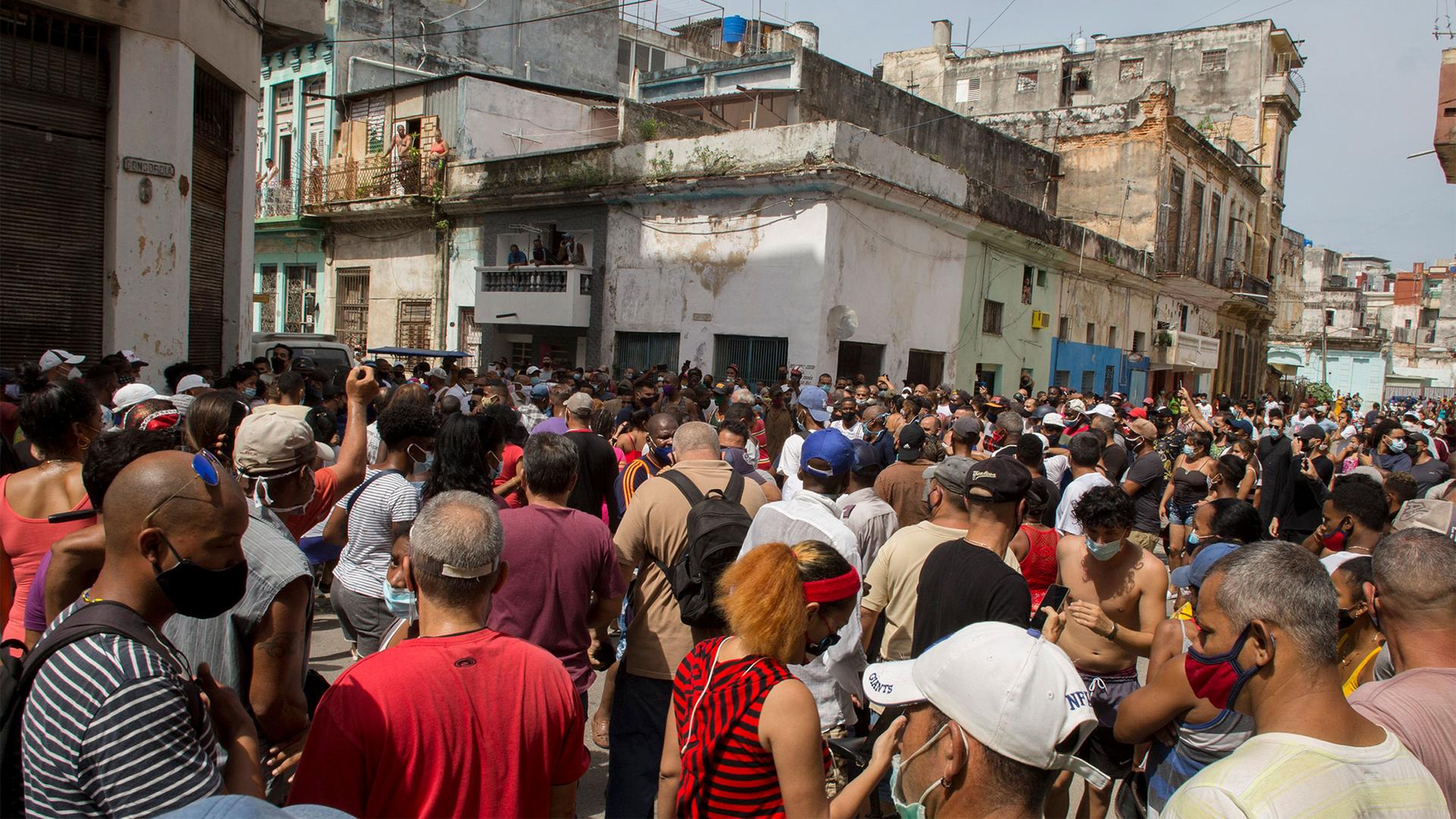 Anti-government protesters march in Havana, Cuba to protest against ongoing food shortages and high prices of foodstuffs
