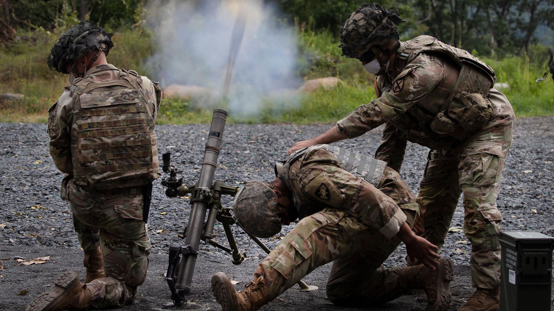 Cadets learn to fire mortars, Friday, Aug. 7, 2020, at the US Military Academy in West Point, New York.