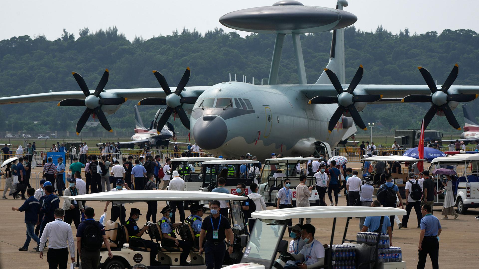 Visitors look at the Chinese military's KJ-500 airborne early warning and control aircraft during 13th China International Aviation and Aerospace Exhibition, also known as Airshow China 2021, in Zhuhai in southern China's Guangdong province