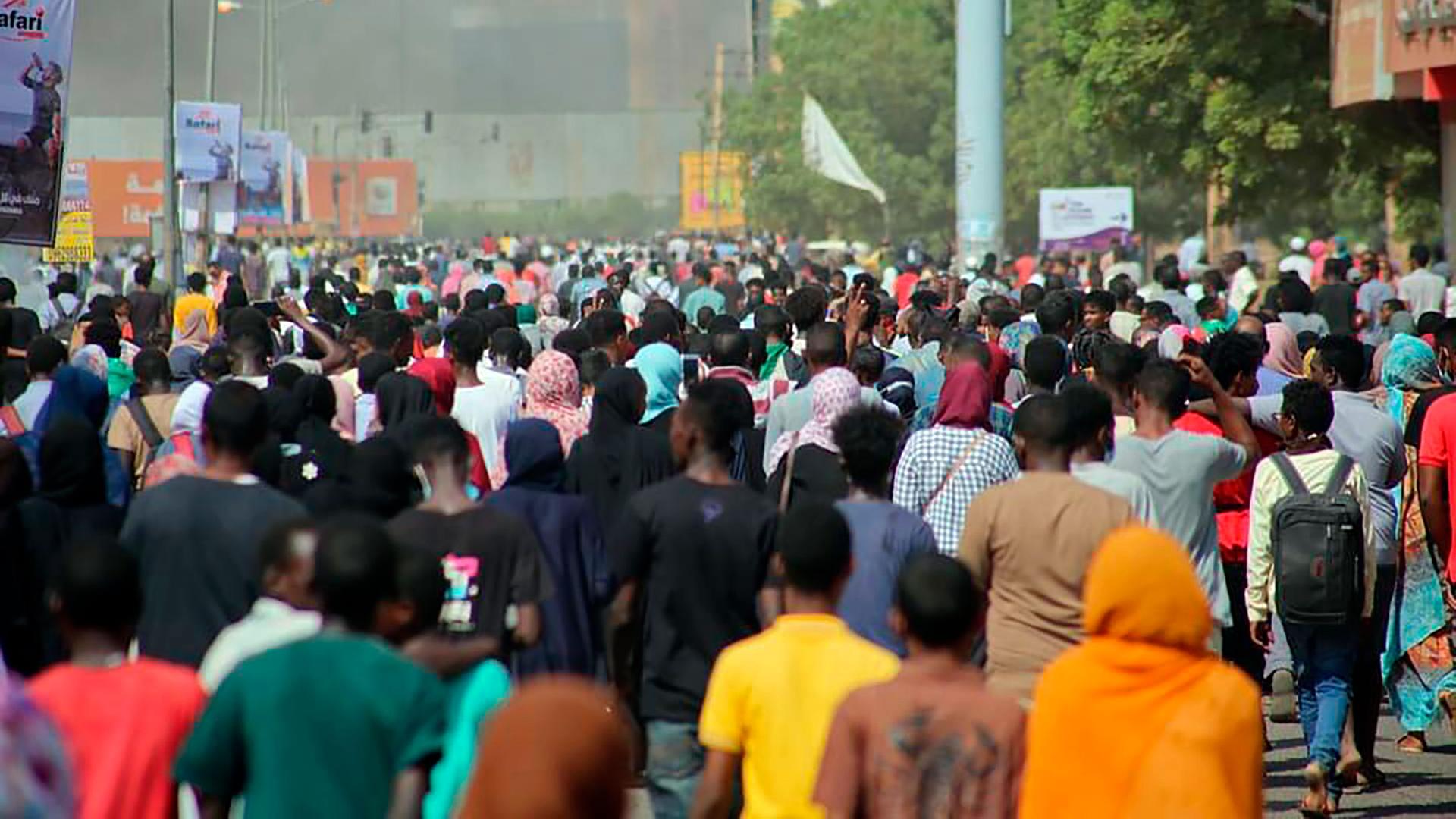 Thousands of pro-democracy protesters take to the streets to condemn a takeover by military officials in Khartoum, Sudan, Monday, Oct. 25, 2021. 