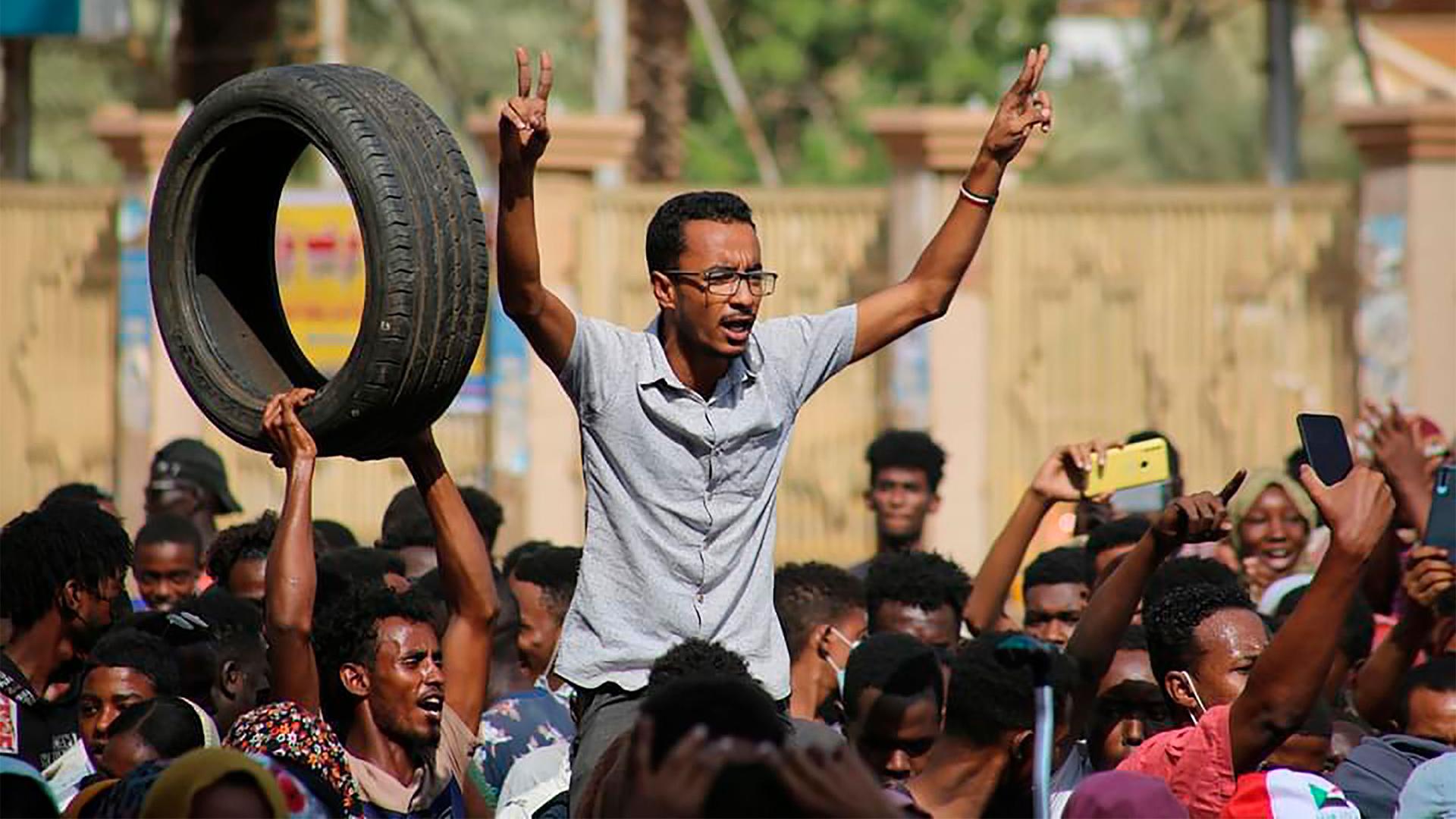 Thousands of pro-democracy protesters take to the streets to condemn a takeover by military officials in Khartoum, Sudan