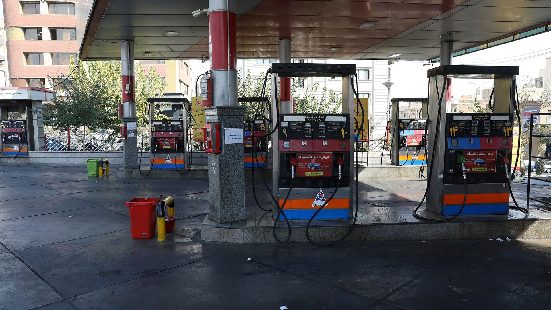 A gas station is empty because the gas pumps are out of service in Tehran, Iran, after a widespread outage of a system that allows consumers to buy fuel with a government-issued card