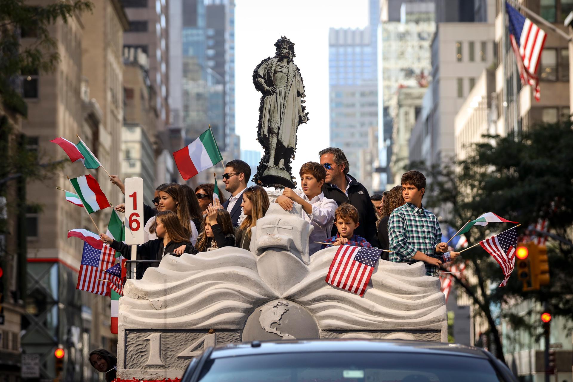 Italian Americans celebrating during a Christopher Columbus Day parade. 