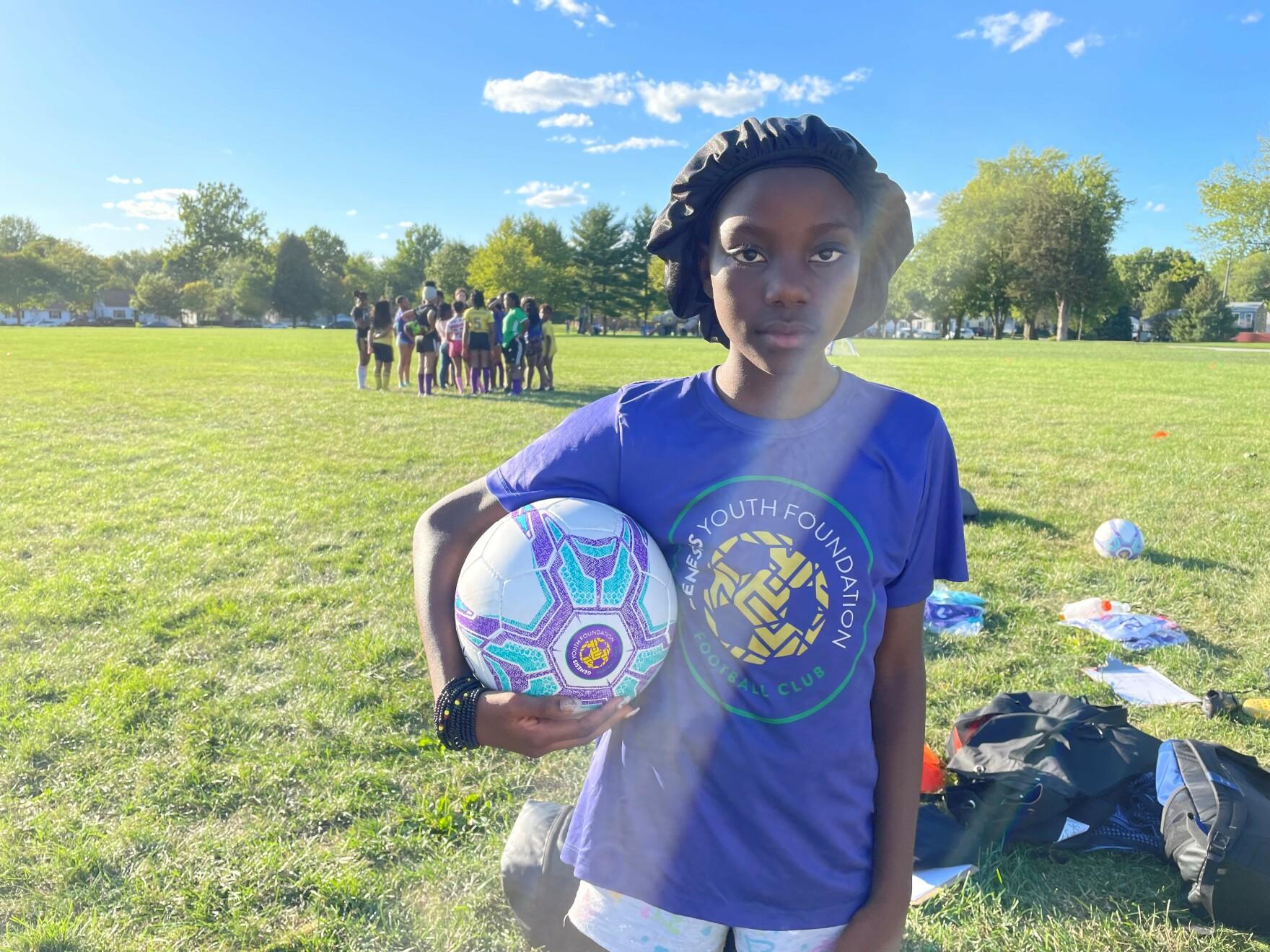 Sarah Ngandu poses seriously for her first photo as captain of her soccer team. She wasn't expecting to get all of the votes that she did.
