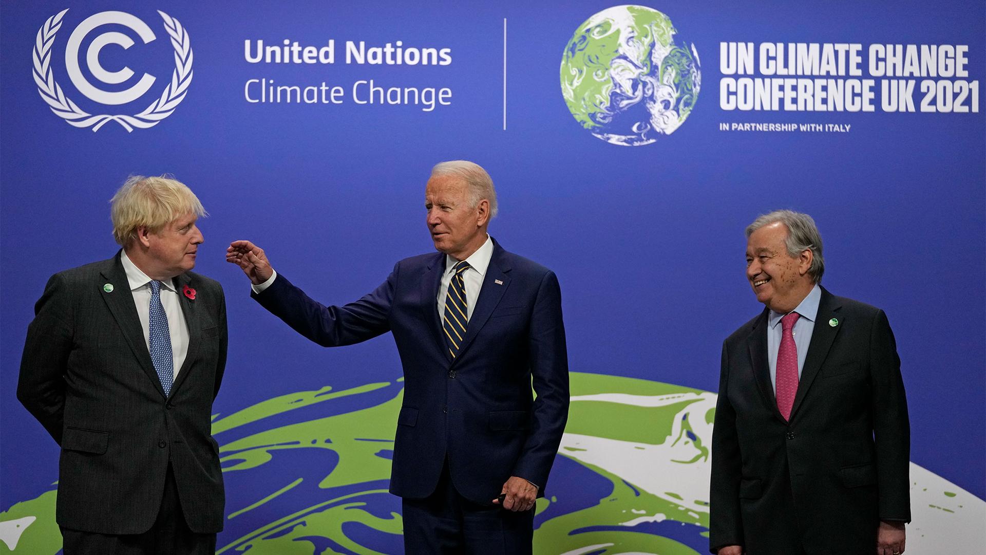 British Prime Minister Boris Johnson and UN Secretary-General Antonio Guterres greet US President Joe Biden at the COP26 UN Climate Summit in Glasgow, Scotland