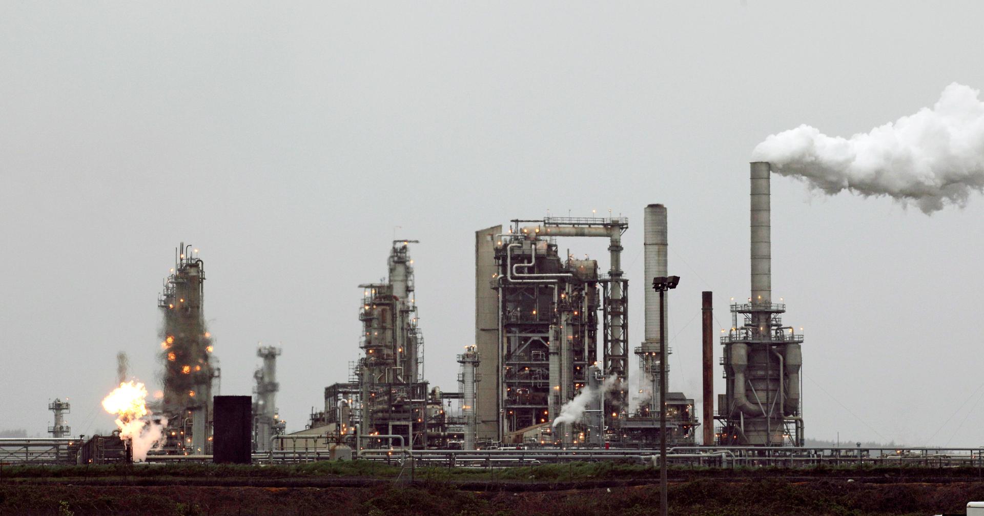 A Tesoro Corp. refinery, including a gas flare flame that is part of normal plant operations, in Anacortes, Washington.