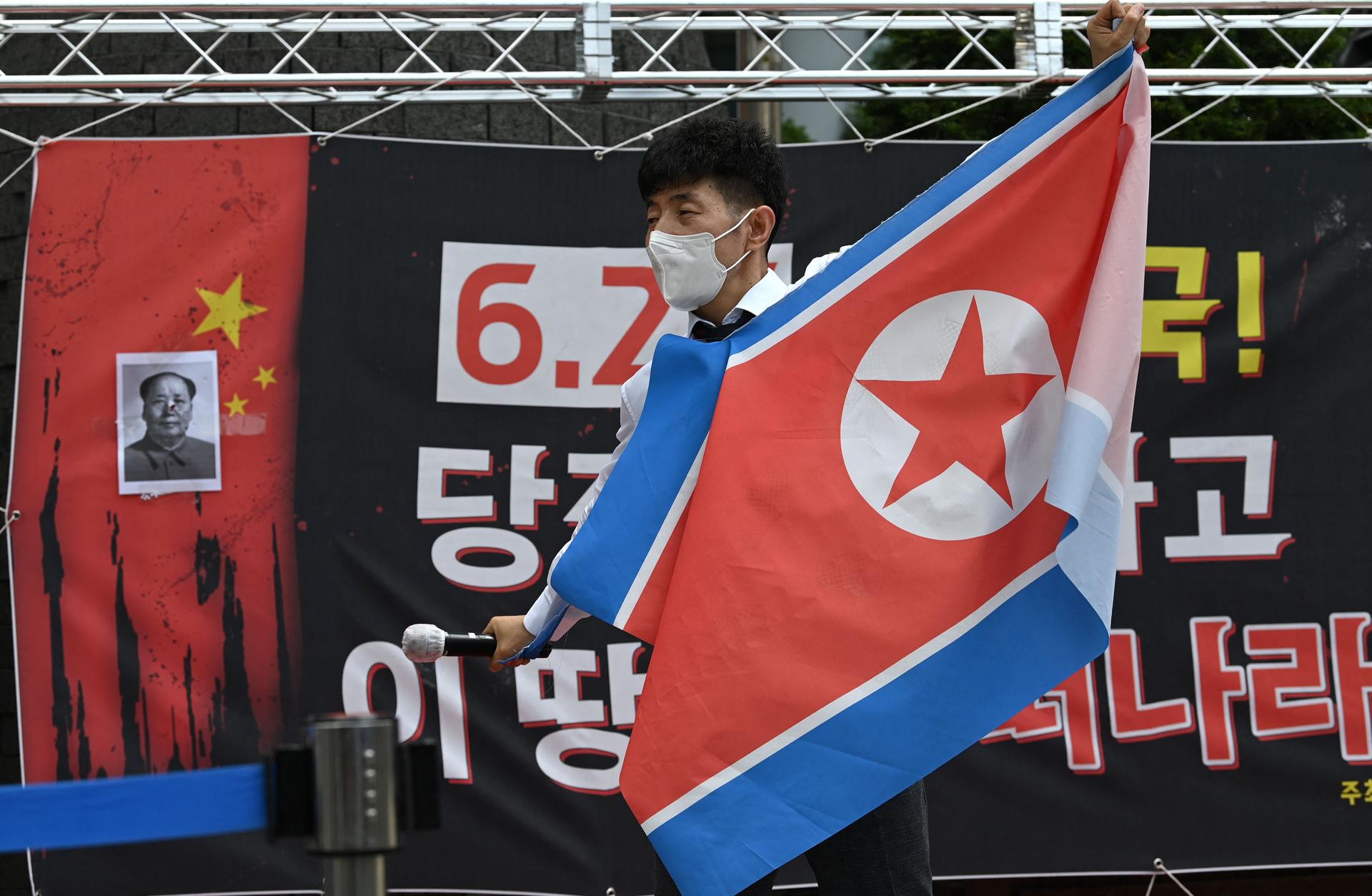 Much of the disinformation trafficked in South Korea involves nationalistic anti-Communist narratives similar to this protester’s anti-North Korea message. 