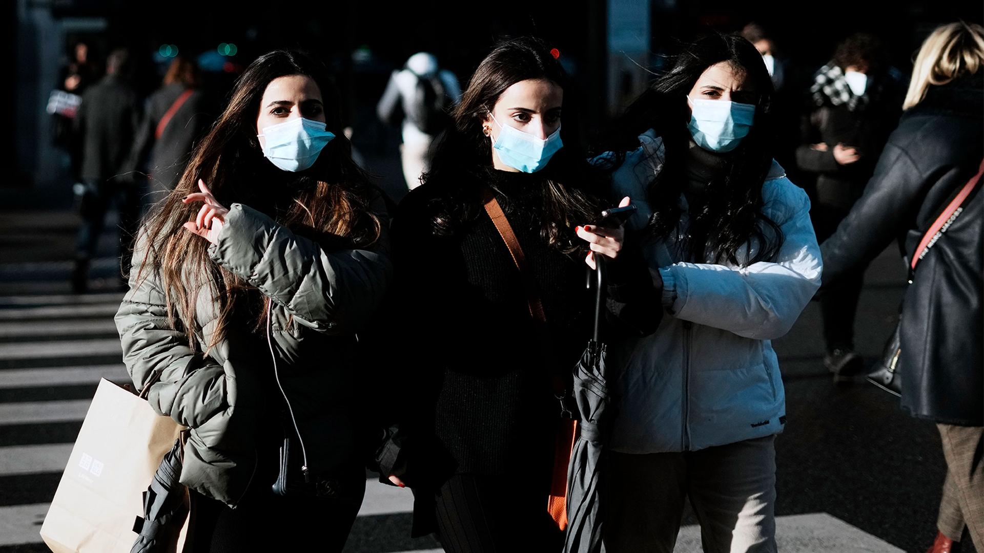 Women wear mask to prevent the spread of the COVID-19, in Paris, France
