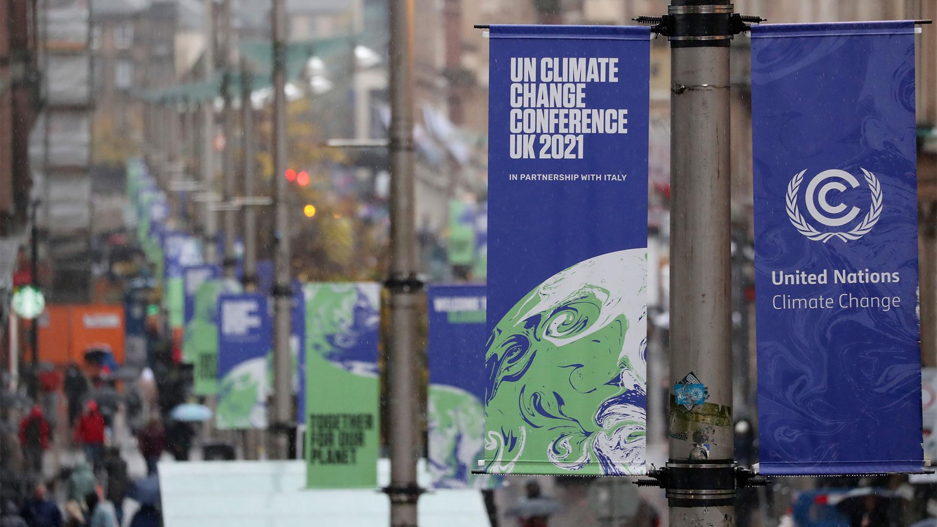 The view of banners for the UN climate conference COP26 displayed in central Glasgow, Scotland