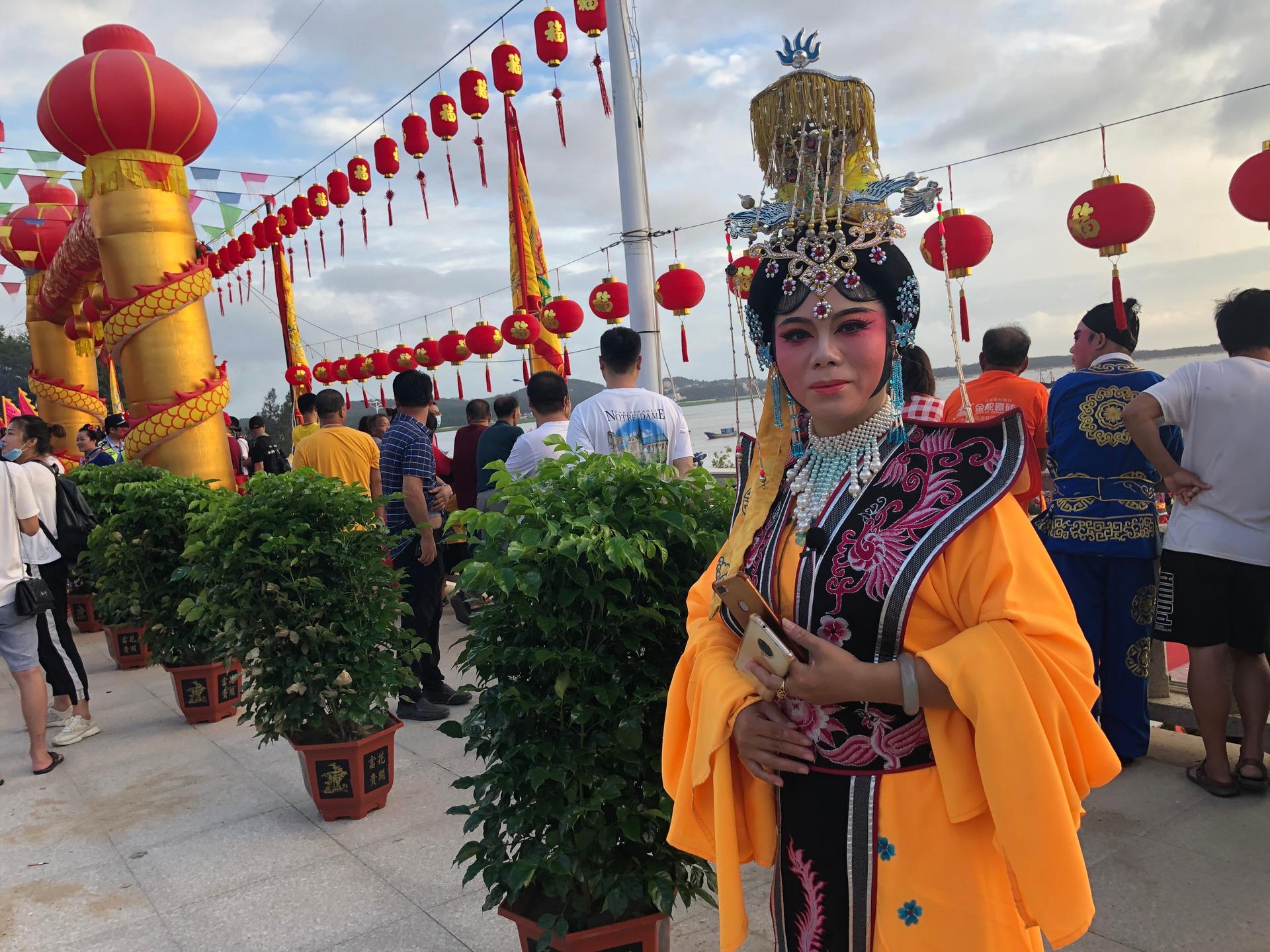 A performer at a procession commemorating the anniversary of the goddess Mazu’s ascension to heaven.