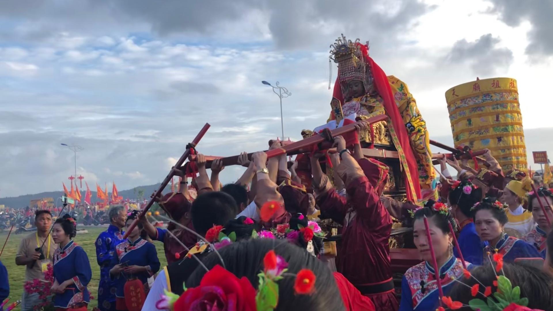 Devotees carry a statue of the goddess Mazu in a procession on Meizhou Island, China.