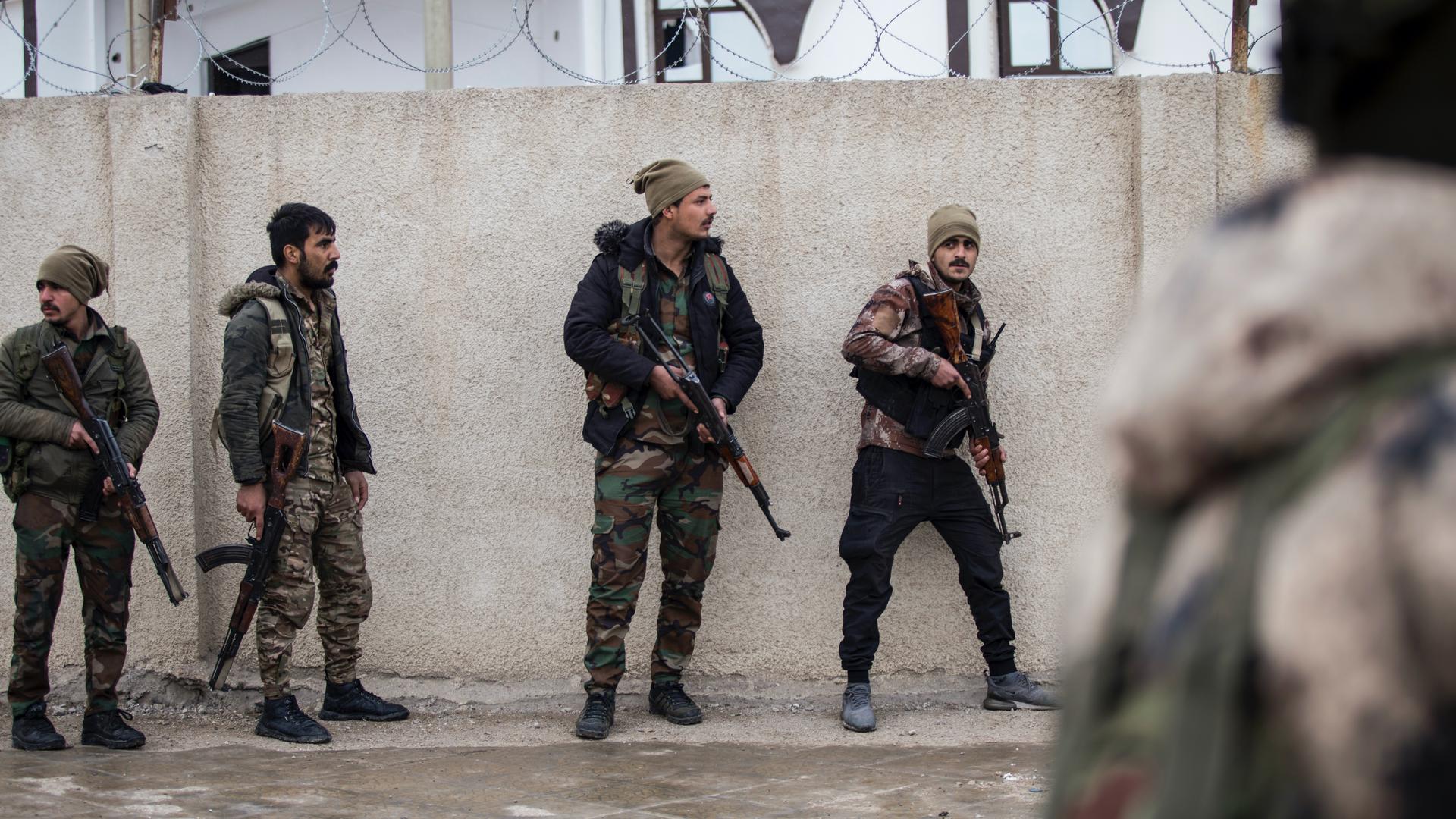 Syrian Democratic Forces soldiers hold a position in Hassakeh, northeast Syria, Jan. 27, 2022. 