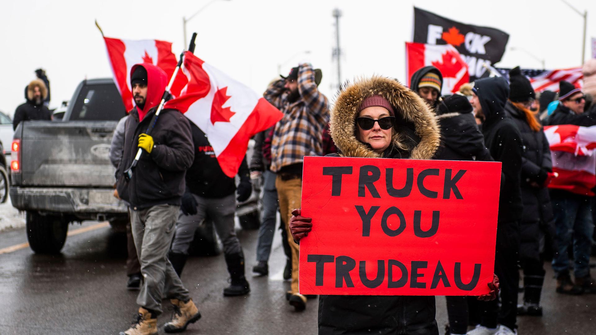 Protestors show their support for the Freedom Convoy of truck drivers who are making their way to Ottawa to protest against COVID-19 vaccine mandates by the Canadian government on Thursday, Jan. 27, 2022, in Vaughan. 
