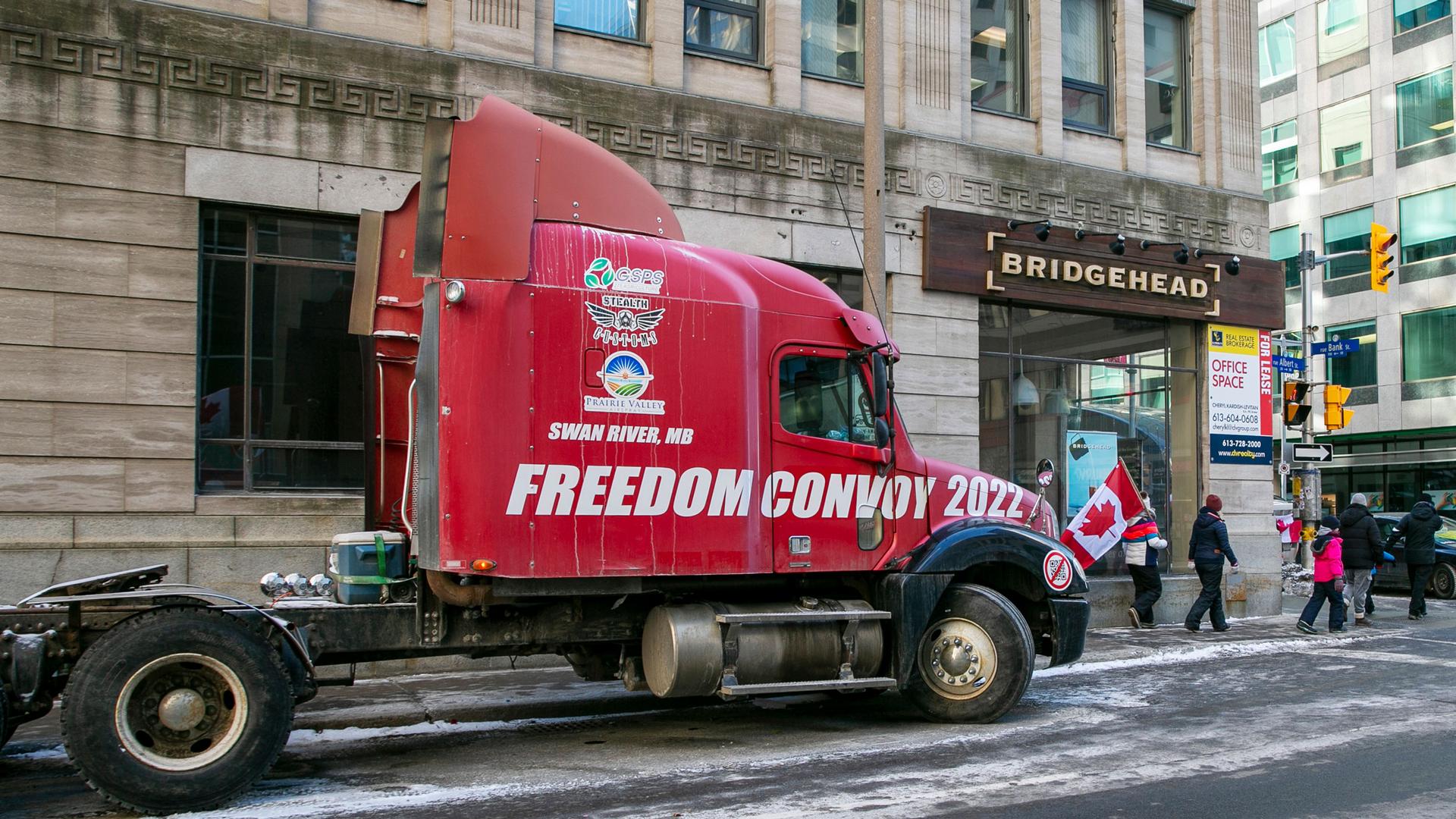 The words "Freedom Convoy 2022" are visible on a truck that is part of a demonstration against COVID-19 restrictions in Ottawa, Ontario, Canada, on Sunday, Feb. 13, 2022. 