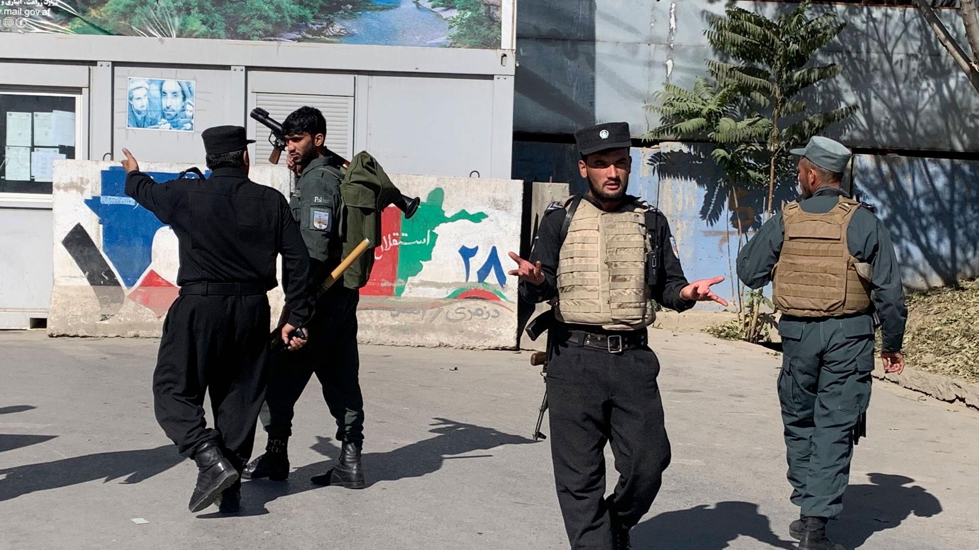 Afghan police arrive at the site of an attack at Kabul University in Kabul, Afghanistan, Monday, Nov. 2, 2020. 