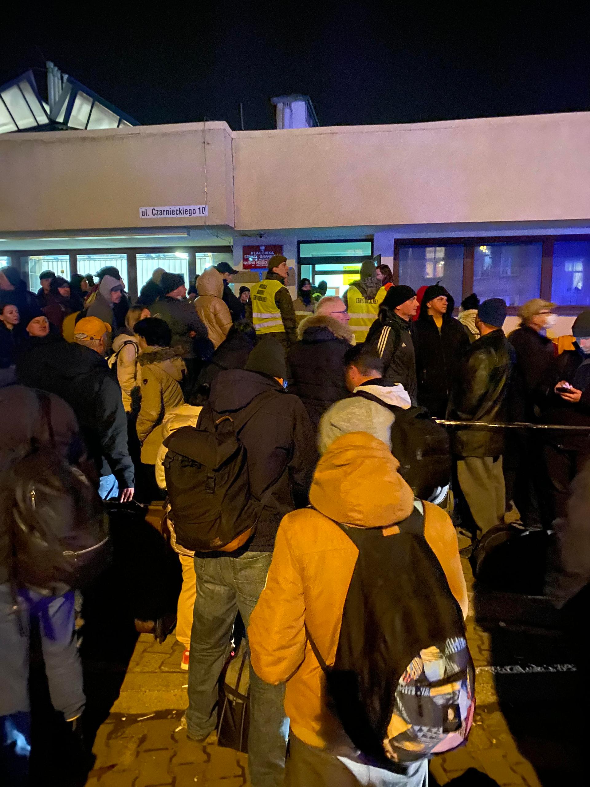Ukrainians wait to board trains back home at the train station in Przemysl.