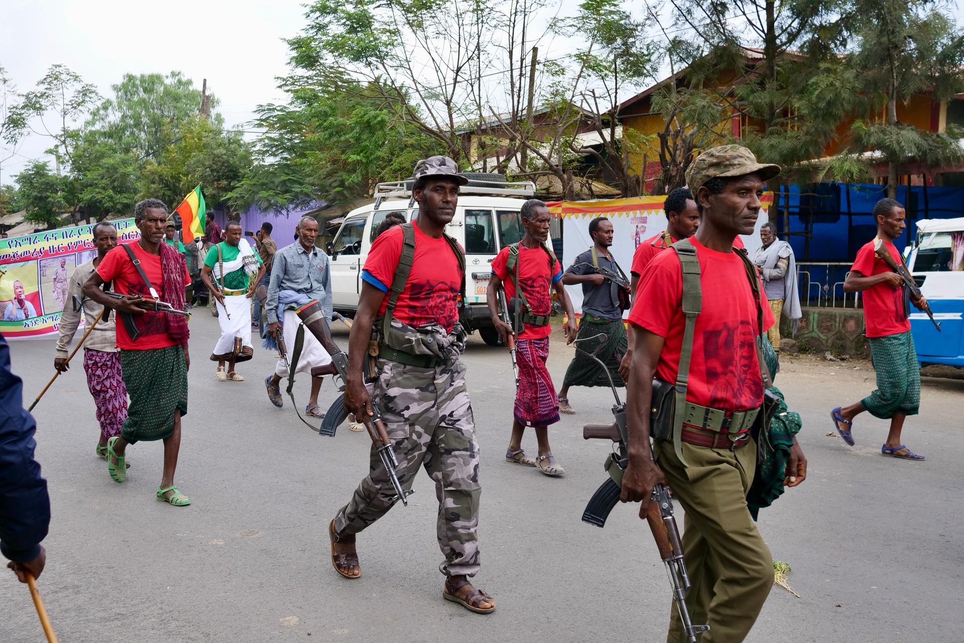Civilian members of the FANO Amhara militia during a procession in Ethiopia's Kobo district, Feb. 20, 2022.