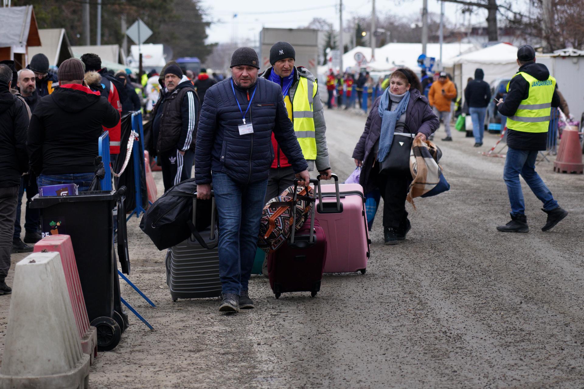 Tents and services are set up at customs in Siret, Romania, to help receive refugees from Ukraine.