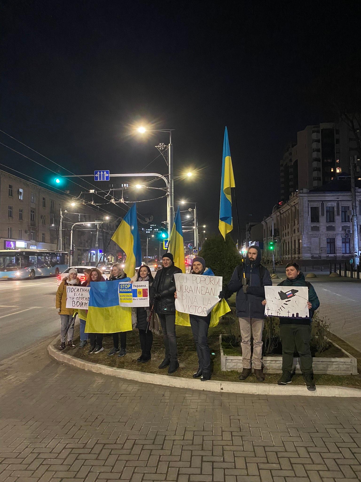 Anton Matusenco (third from left) and friends hold an anti-war protest outside the Russian Embassy in Chisinau, Moldova.
