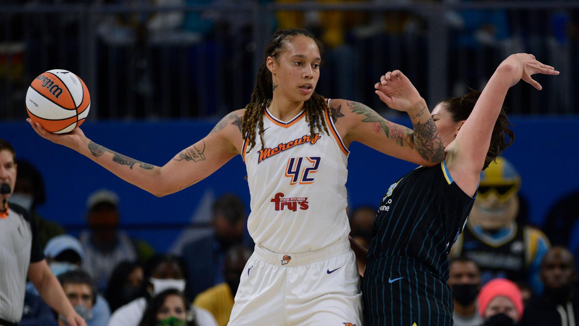 Phoenix Mercury's Brittney Griner (42) elbows Chicago Sky's Stevanie Dolson (31) during the second half in Game 4 of the WNBA Finals Sunday, Oct. 17, 2021, in Chicago, Illinois, USA. 