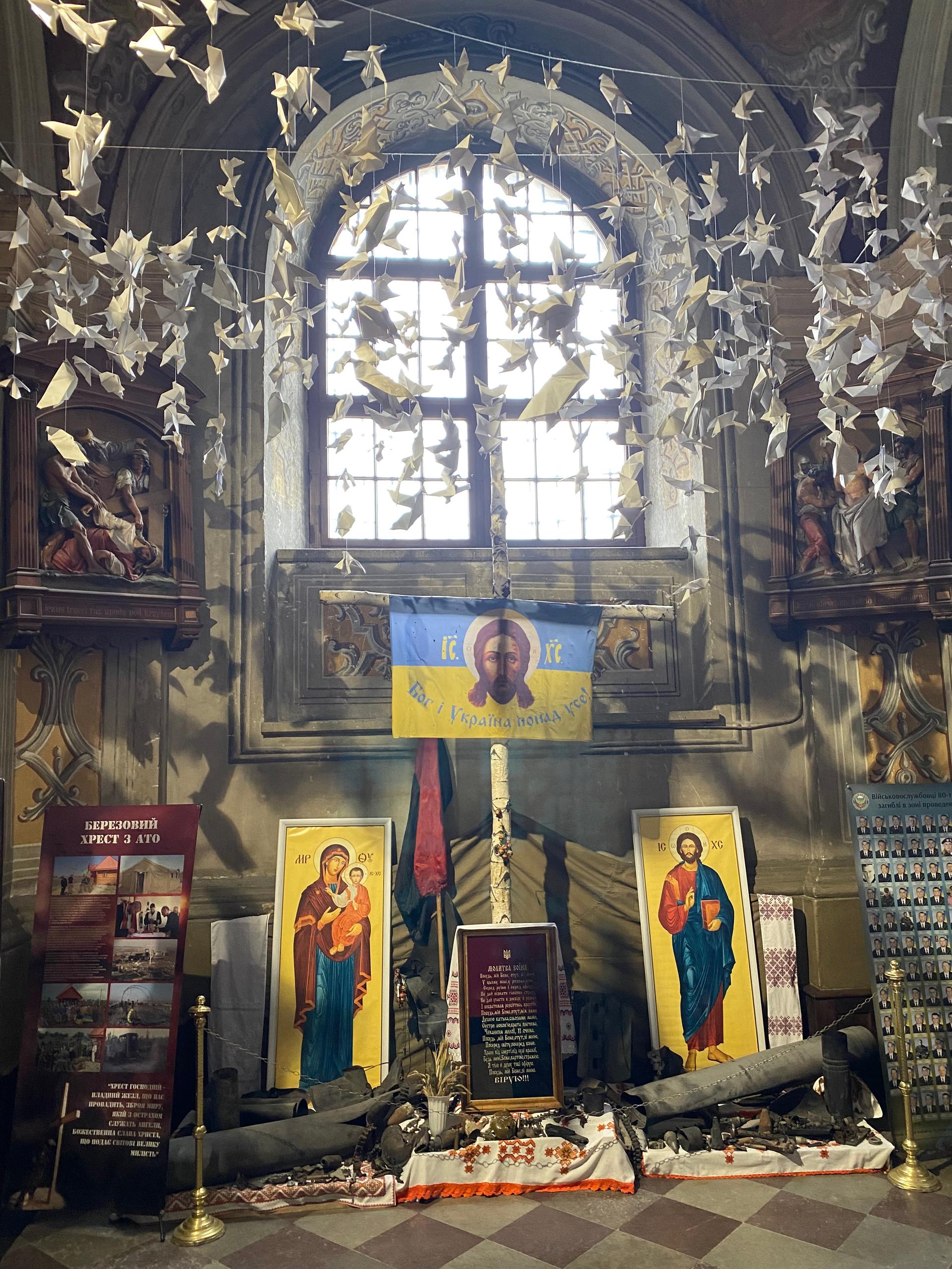 At Saints Peter and Paul Garrison Church, memorials to fallen soldiers from the 2014 conflict in eastern Ukraine