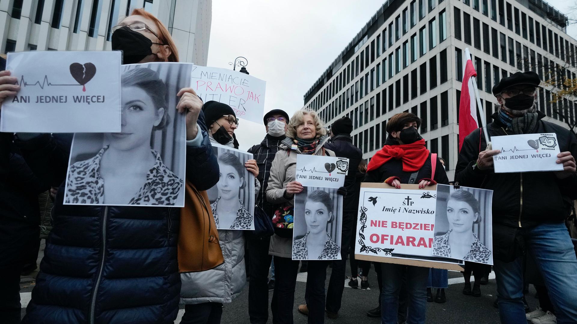 Protesters gather outside Poland's Constitutional Tribunal in Warsaw, Poland, on Nov.6, 2021, to protest against the restrictive abortion laws after a woman died of complications during her pregnancy. 
