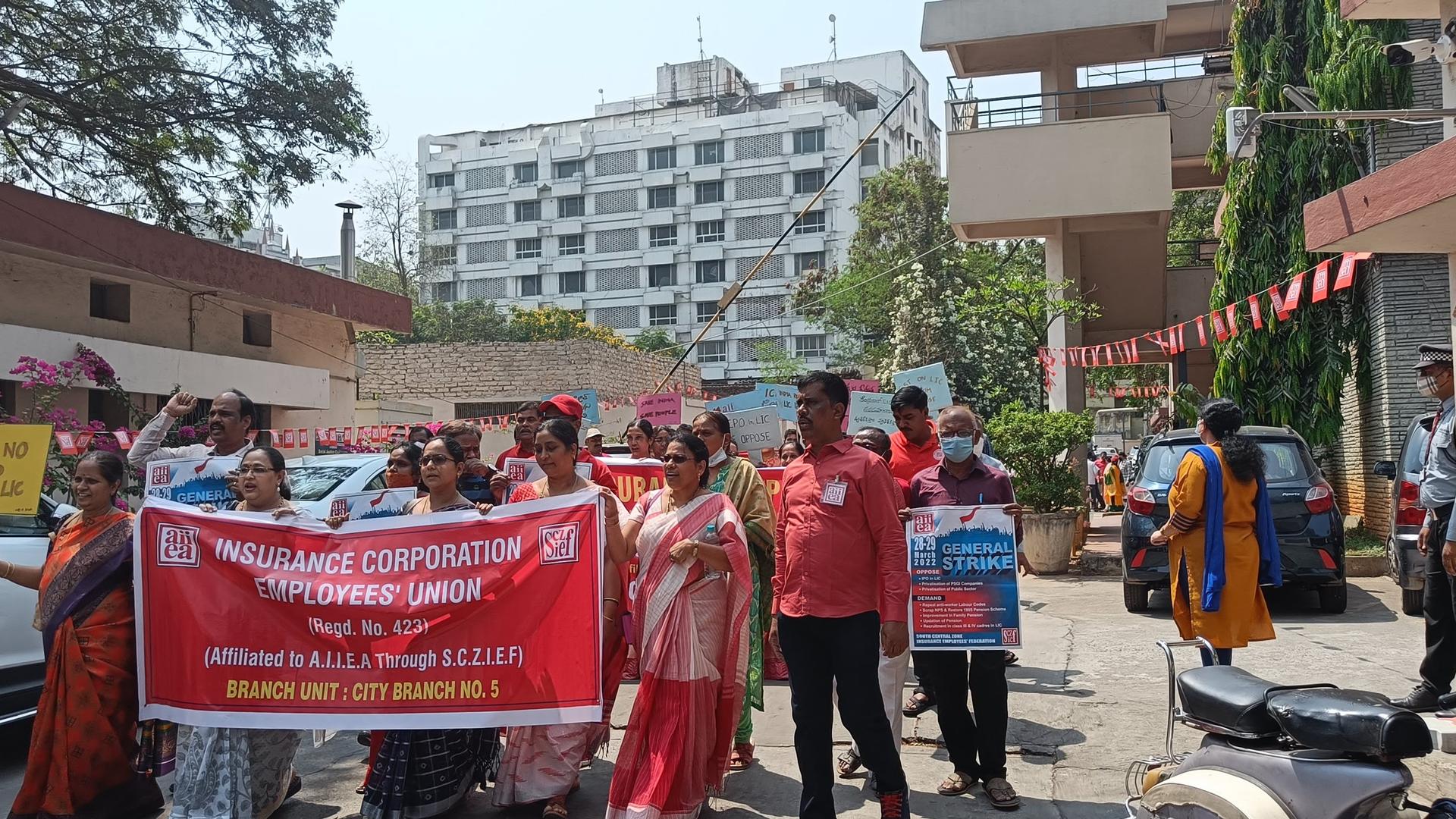 Members of the All India Insurance Employees' Association gather at LIC's office in Hyderabad in southern India to protest against the company's IPO, which they say goes against its ethos.